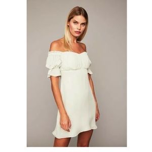 Stone cold fox silk mint color dress with boning and ruching at bust